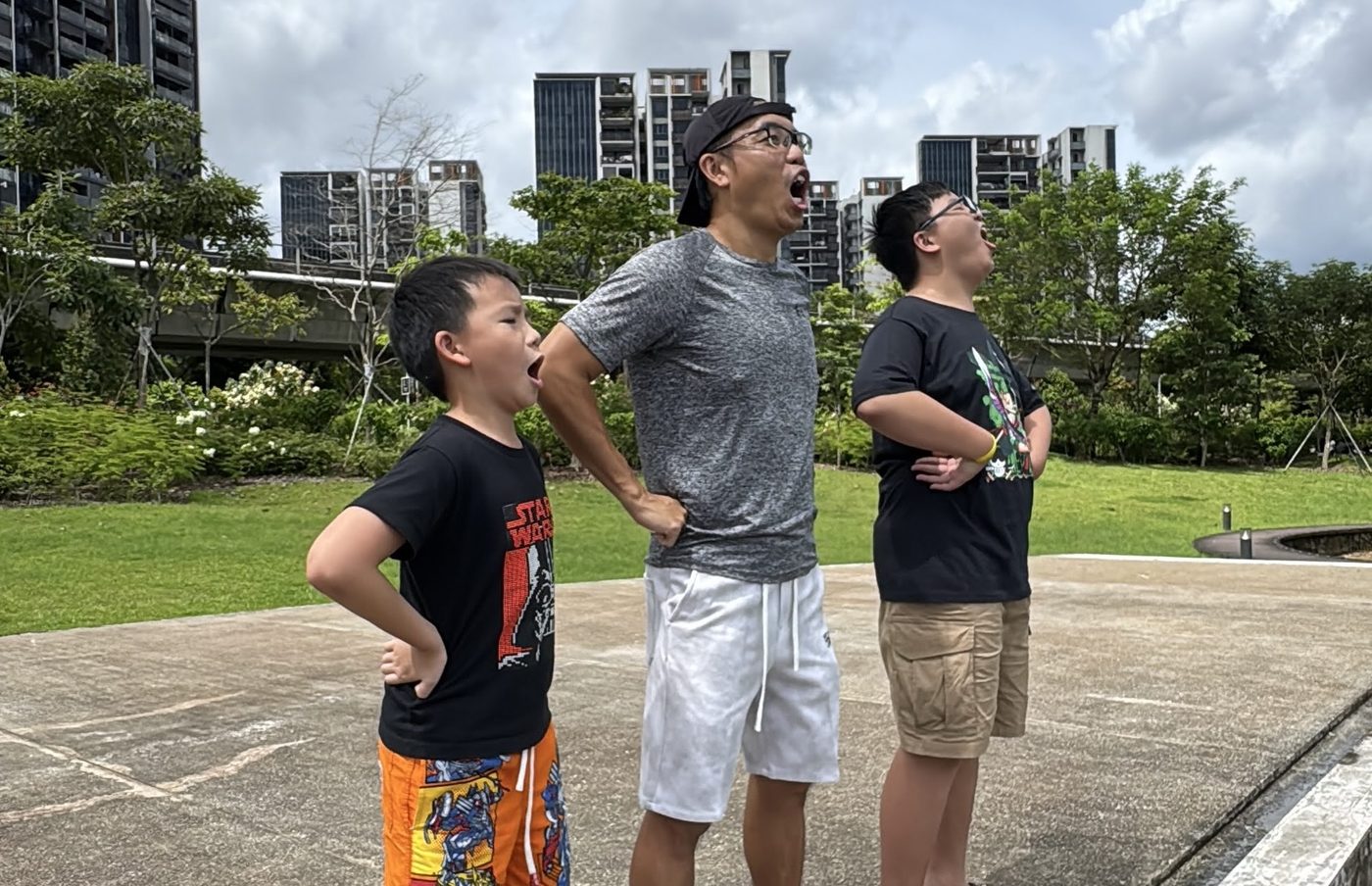 Runner Kao creating short-form video content with kids in Singapore park